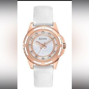 Bulova ladies rose gold with diamond accent white leather watch.